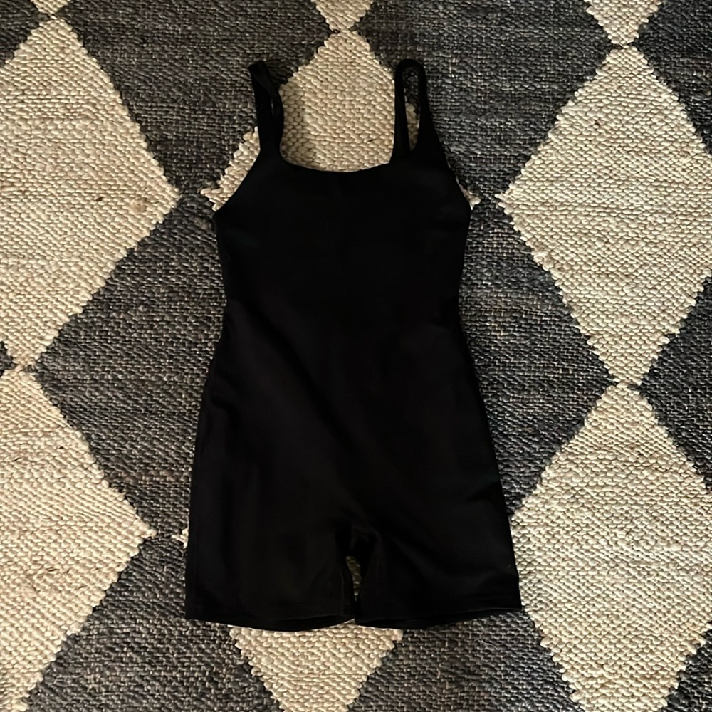 New without tags, fleo size small black one piece